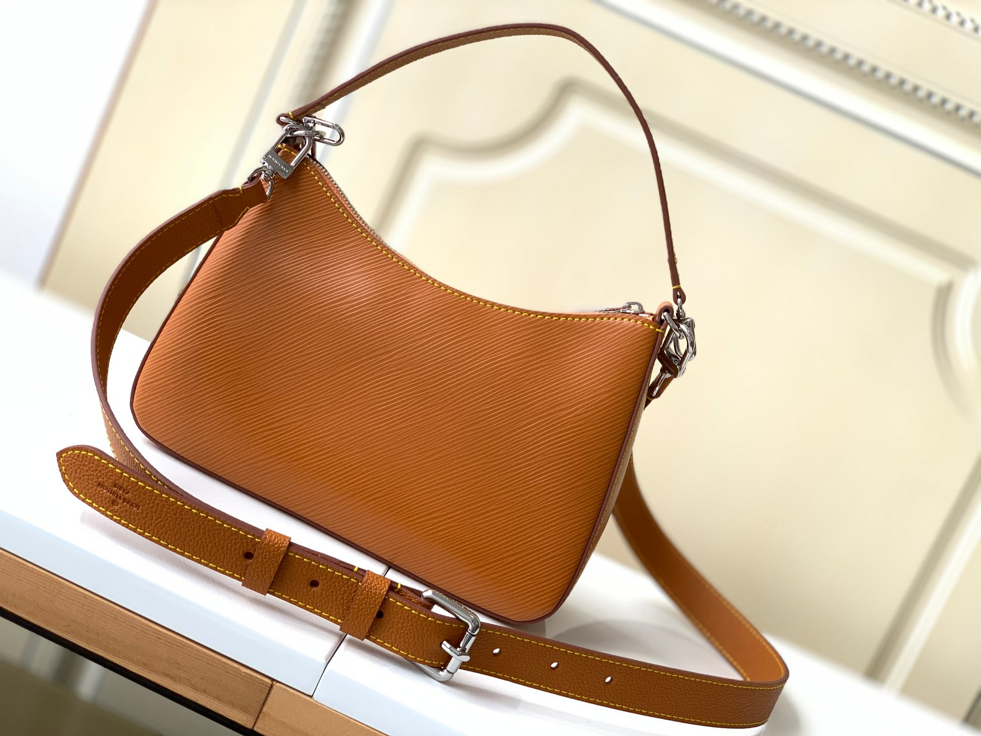 Louis Vuitton Tan Leather Shoulder Bag with Front Pocket and Chain Detail