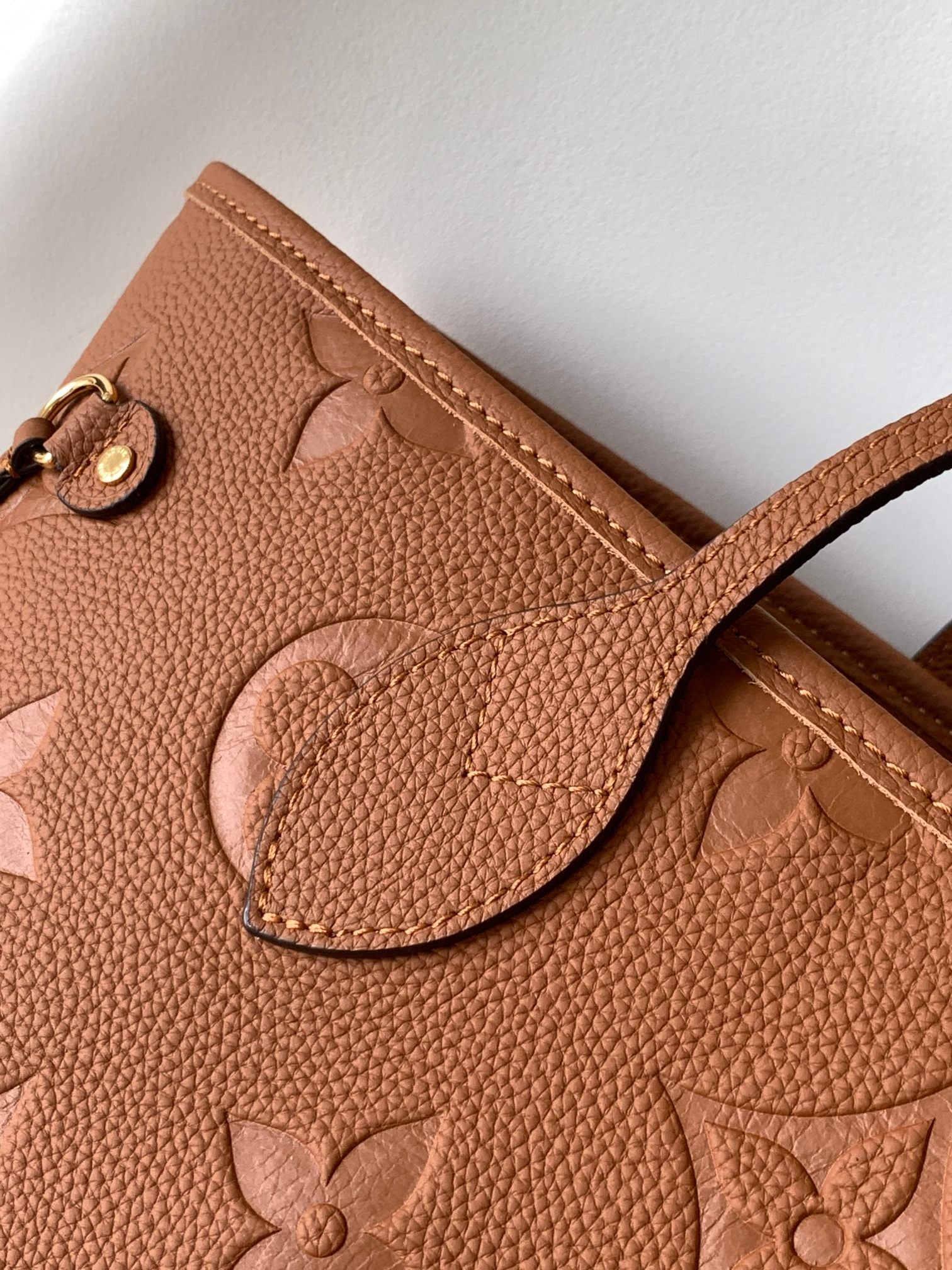 Brown Floral Embossed Leather Tote Bag with Side Drawstrings
