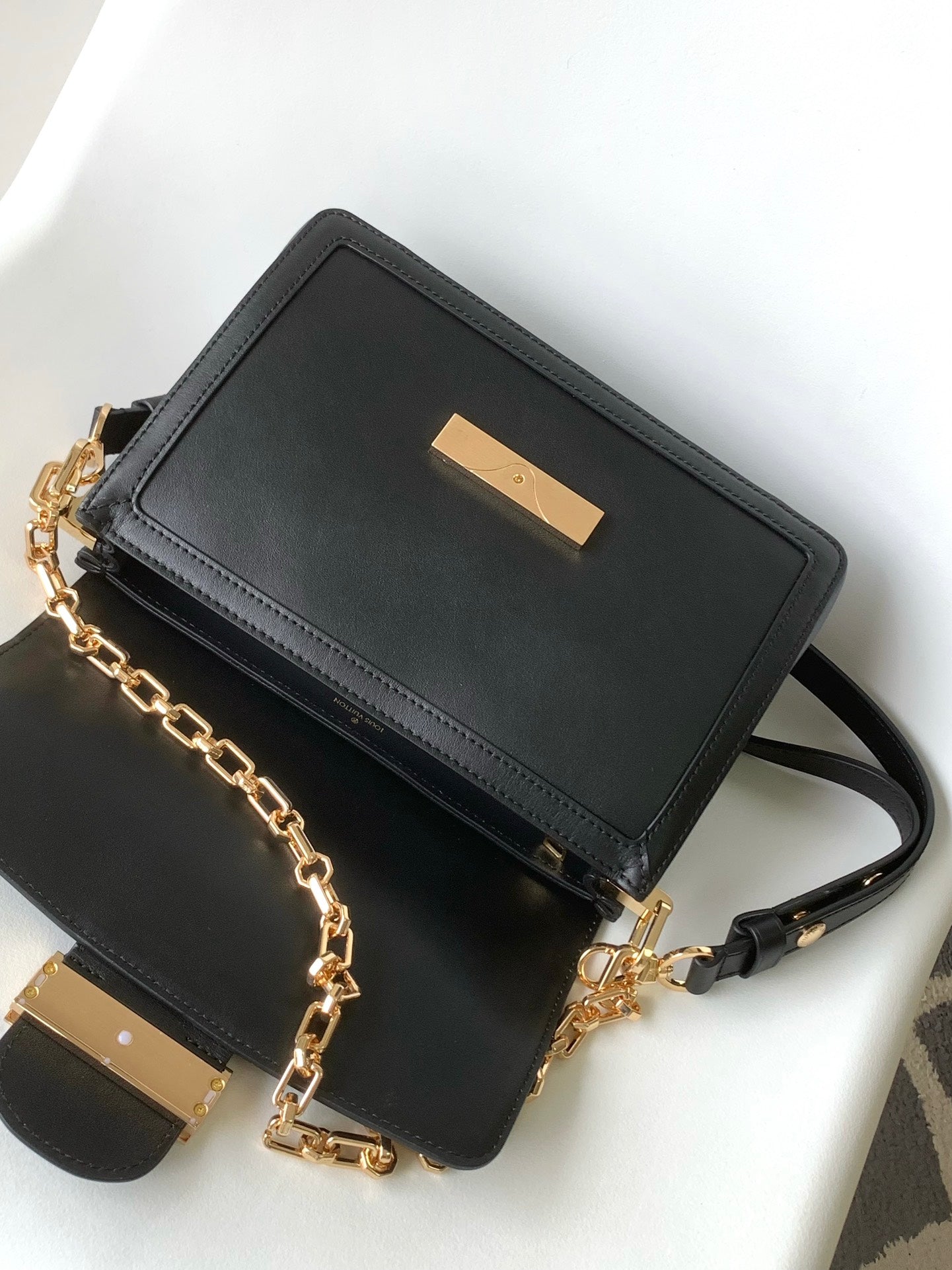 Women's Elegant Black Faux Leather Crossbody Bag with Gold Chain Detail