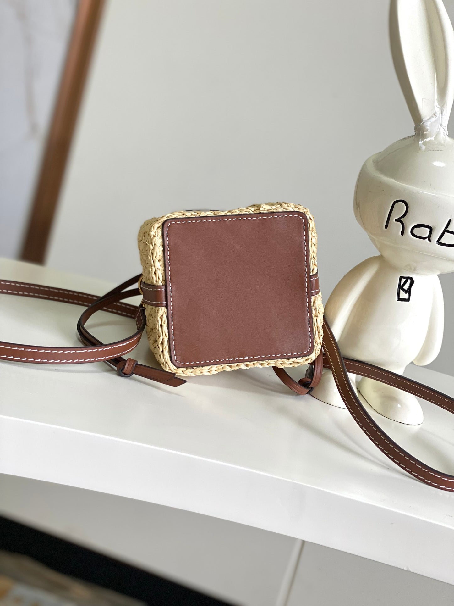 Louis Vuitton Woven Straw Crossbody Bucket Bag with Brown Leather Details