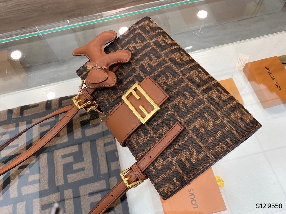 Fendi FF Monogram Canvas Baguette Bag with Leather Trim and Dog Charm
