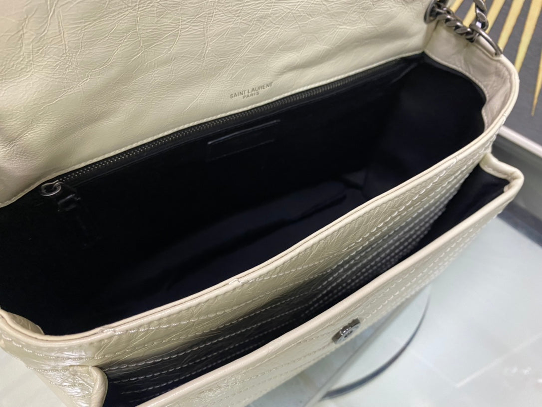 Saint Laurent Niki Medium Shoulder Bag in Quilted Vintage Leather - Off-White