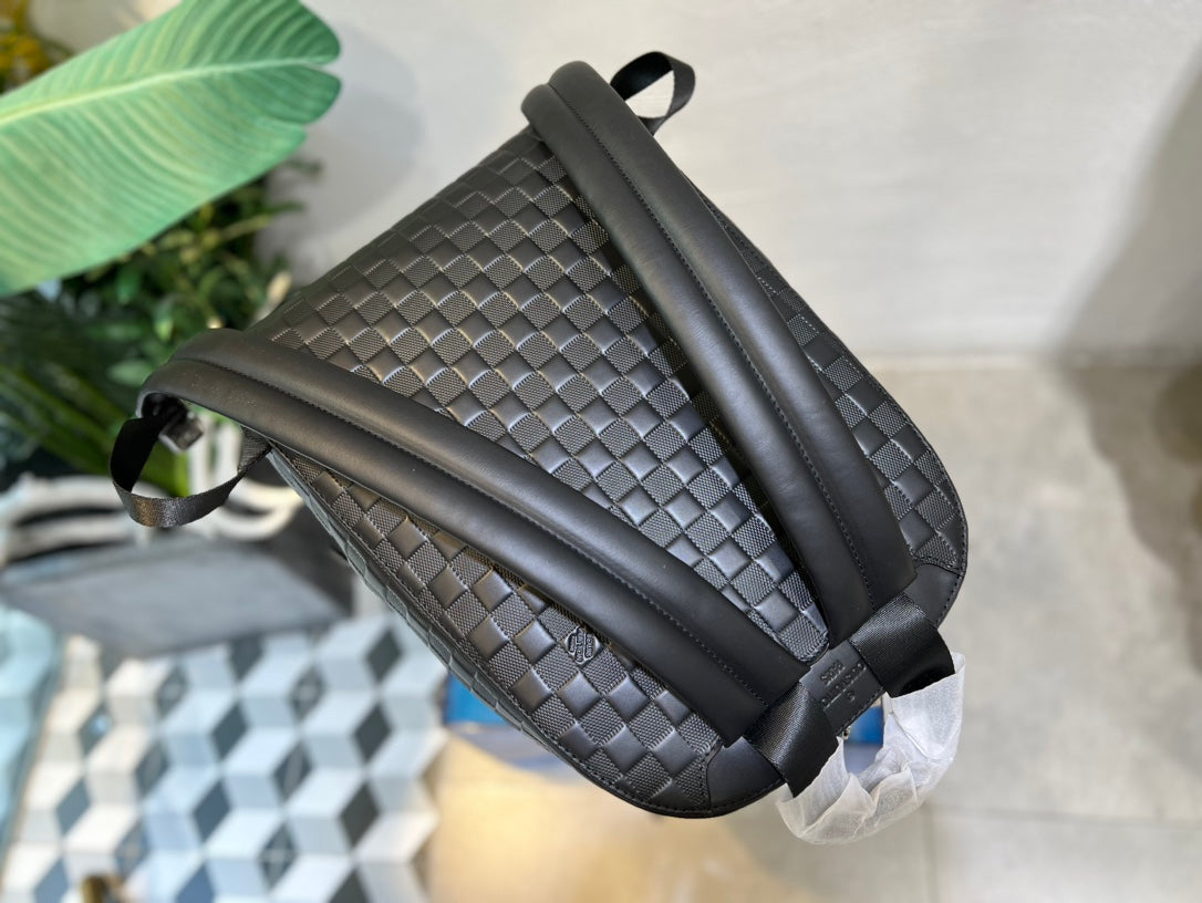 Louis Vuitton Black Woven Leather Texture Unisex Backpack with Zip Front Pocket