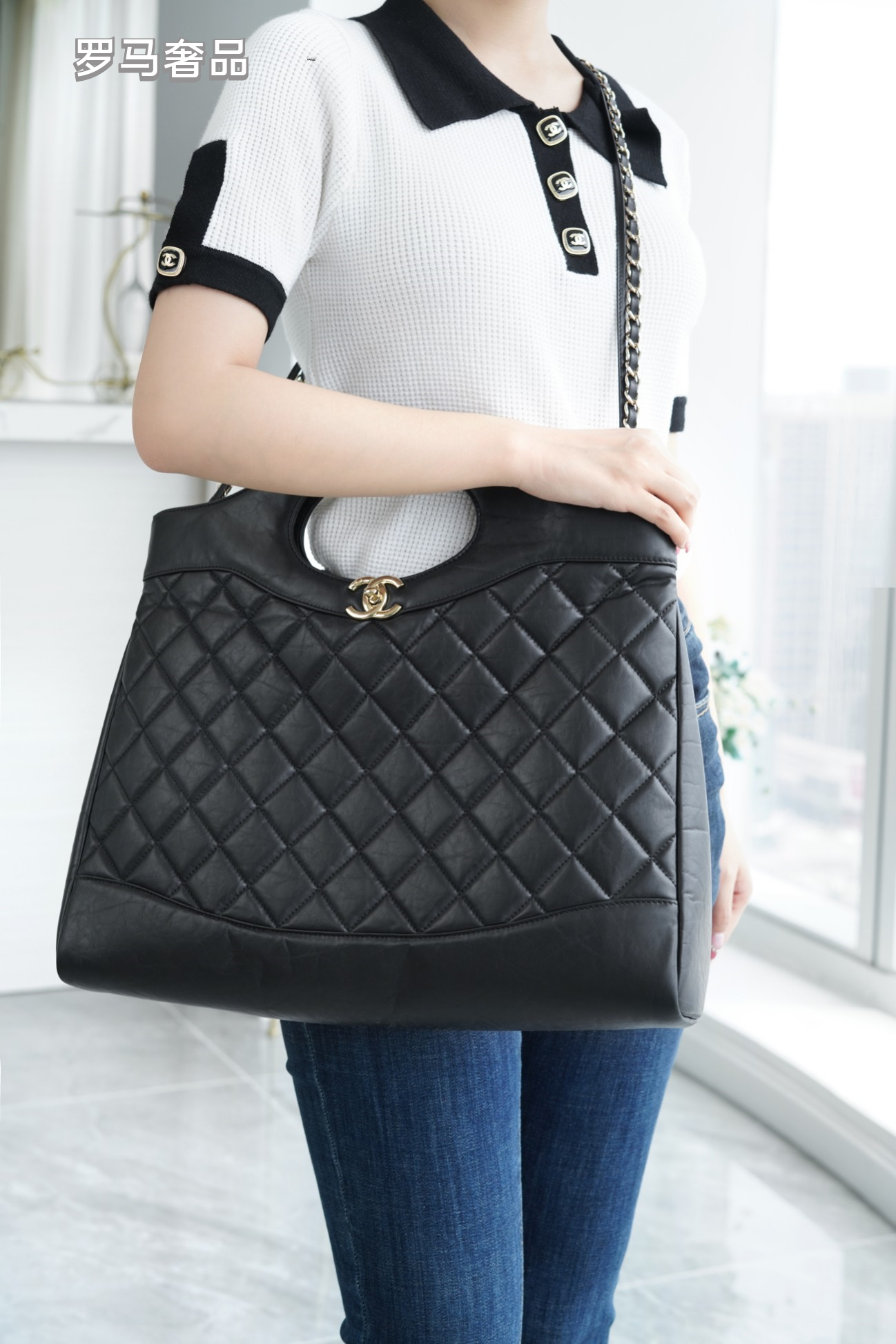 Luxury Black Quilted Leather Handbag with Gold-Tone Chain Strap and Cut-Out Handles
