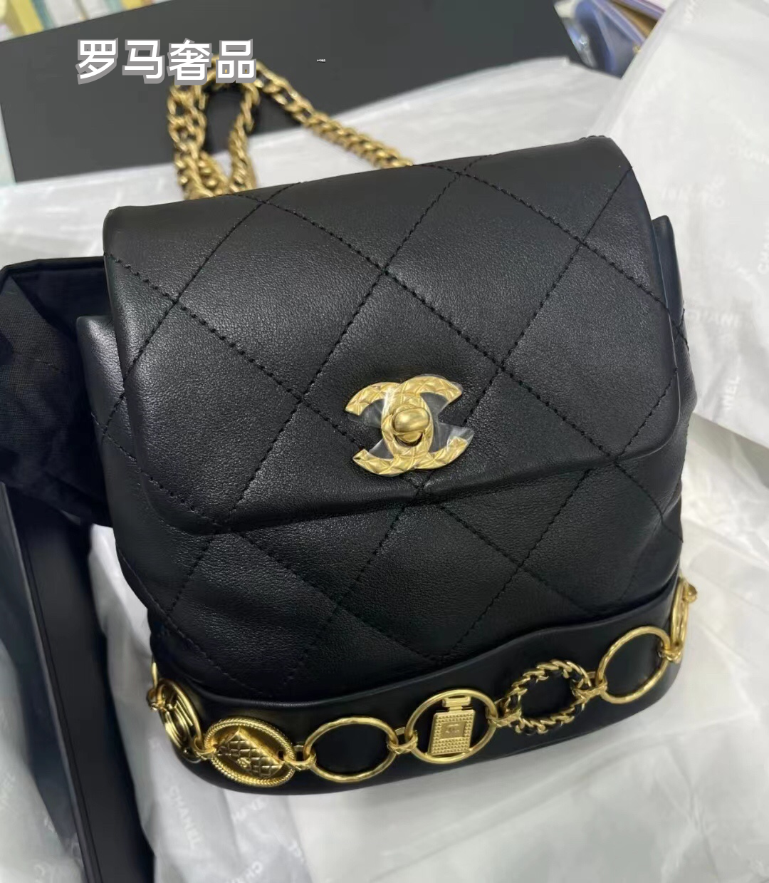 Chanel Vintage Mini Quilted Leather Backpack with Medallion Charm Chain Detail - Black/Gold