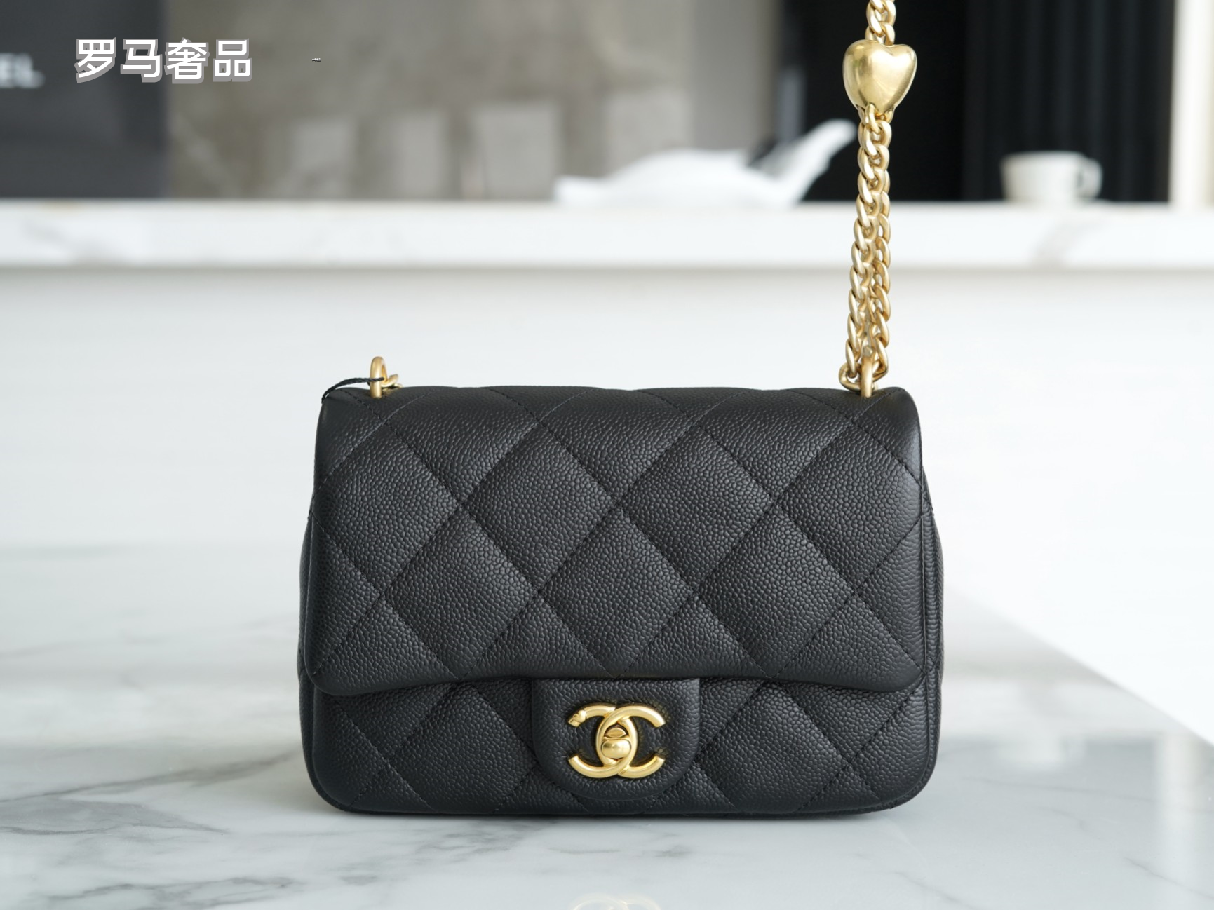 Chanel Quilted Leather Mini Flap Bag with Gold Heart Charm Chain - Black
