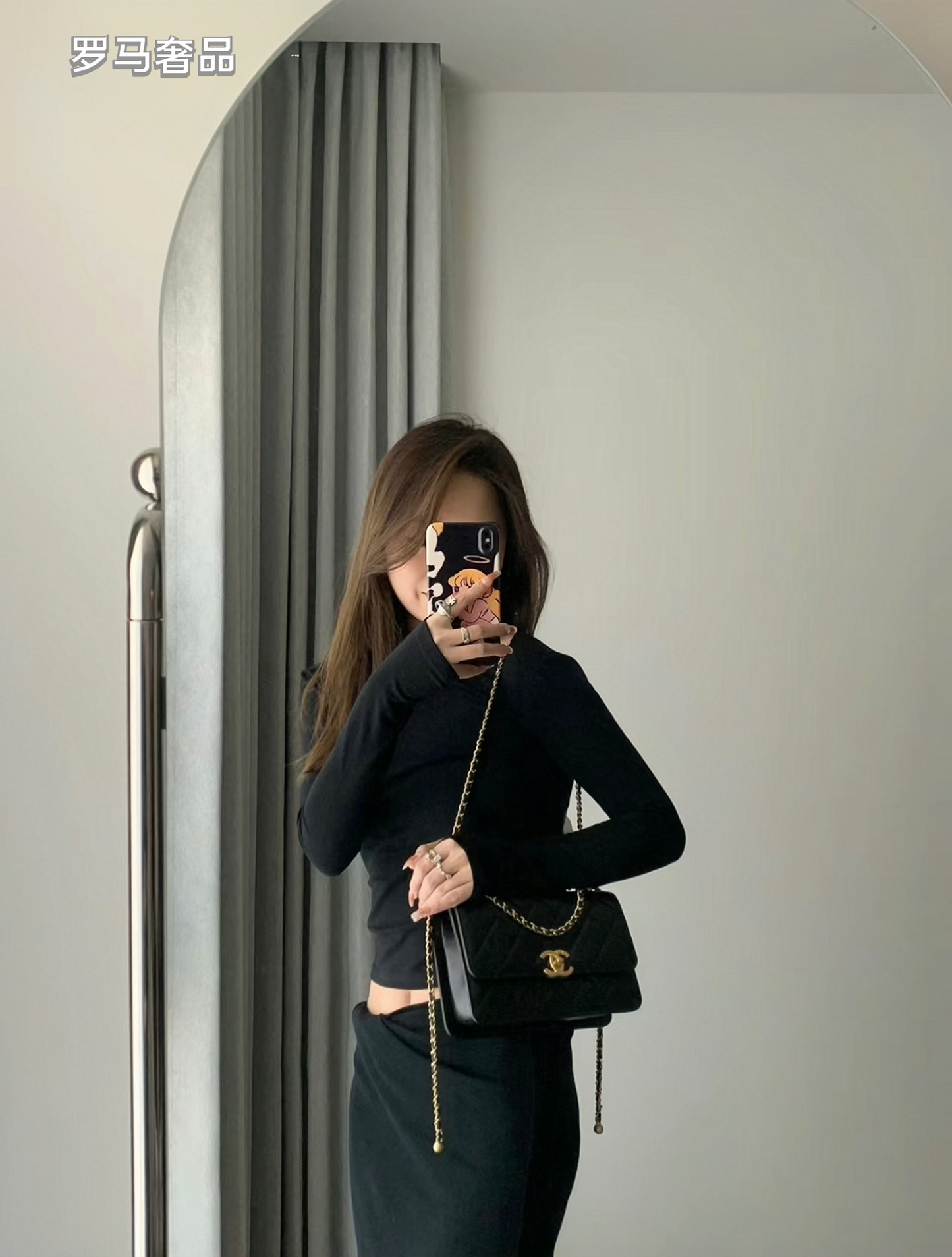 Chanel Black Quilted Lambskin Mini Flap Bag with Gold-Tone Hardware