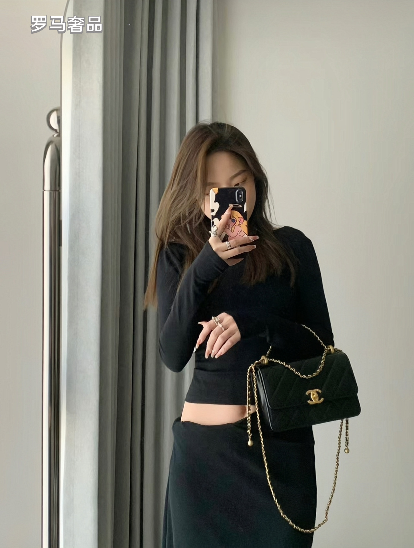 Chanel Black Quilted Lambskin Mini Flap Bag with Gold-Tone Hardware