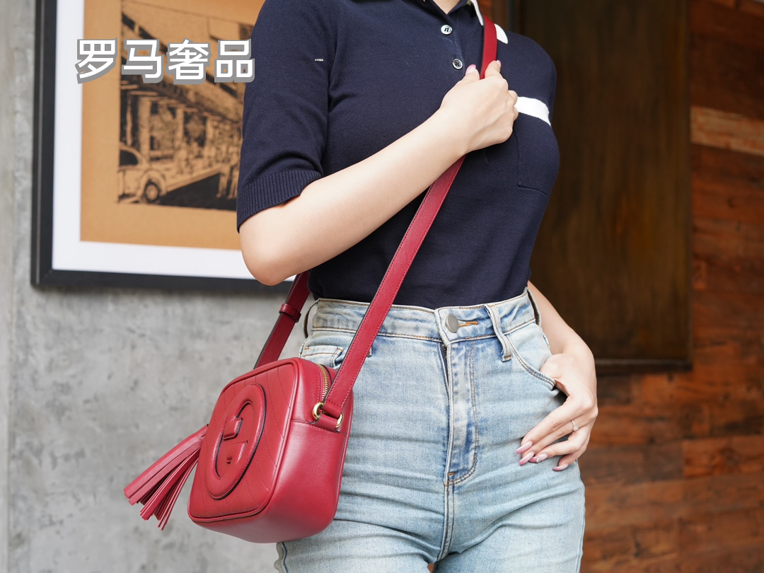 Gucci Red Leather Crossbody Camera Bag with Embossed Logo and Tassel